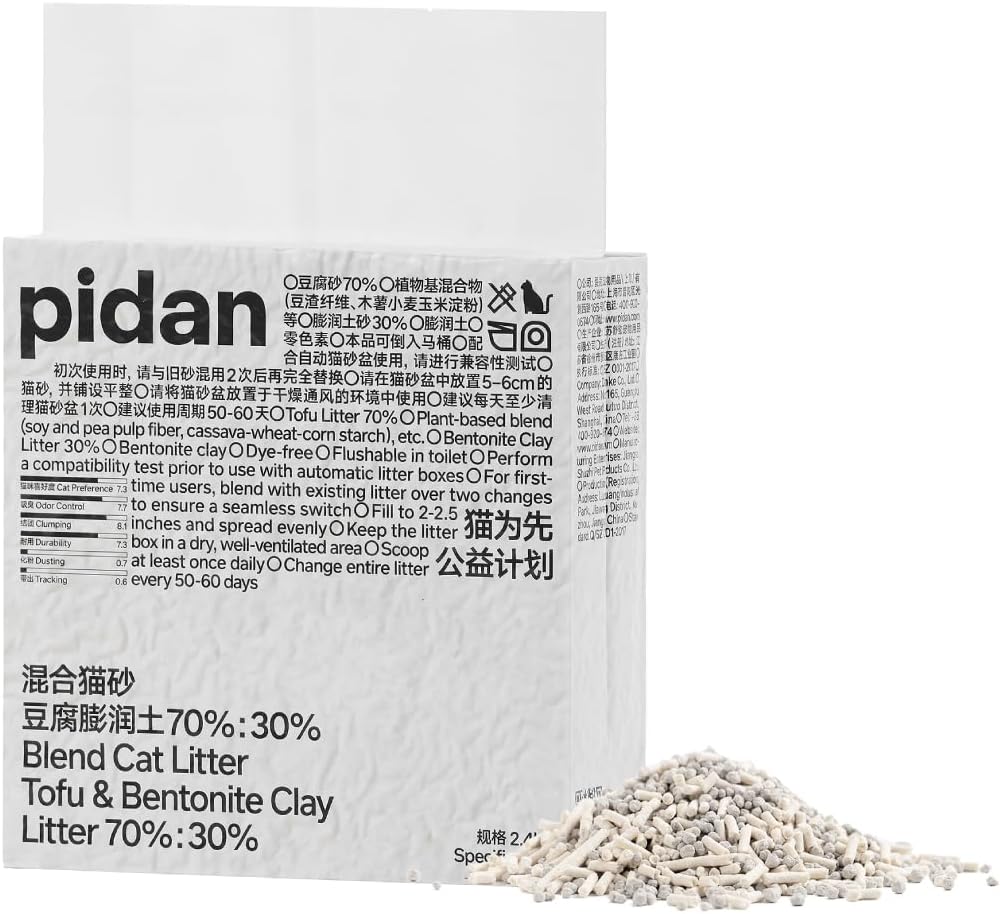 pidan tofu and bentonite blend litter bag labelled70:30 beside a pile of mixed pellets and granules